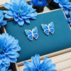 Øredobber i sølv Sommerfugl, blå glassemalje. AMORIN - 842112