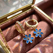 Kreoler i forgylt sølv med cirkonia og blåveis. LIV - 701412